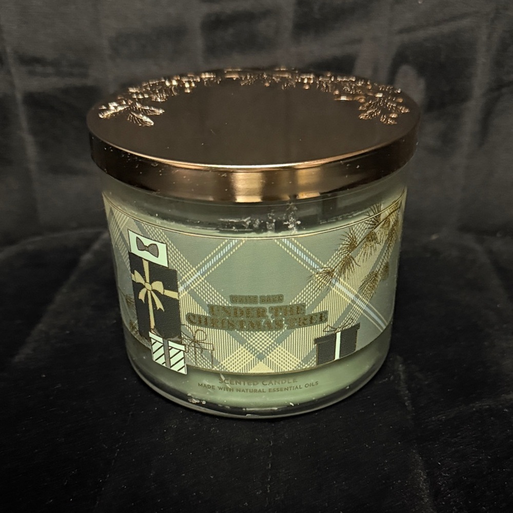 Bath and Body Works Three-Wick Candle with festive Lid Under the Christmas Tree